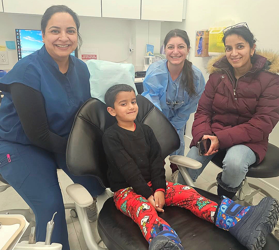 Dr. Kaur, with our patient Manvick, our Dental Hygienist Alisha, and Manvick’s mom