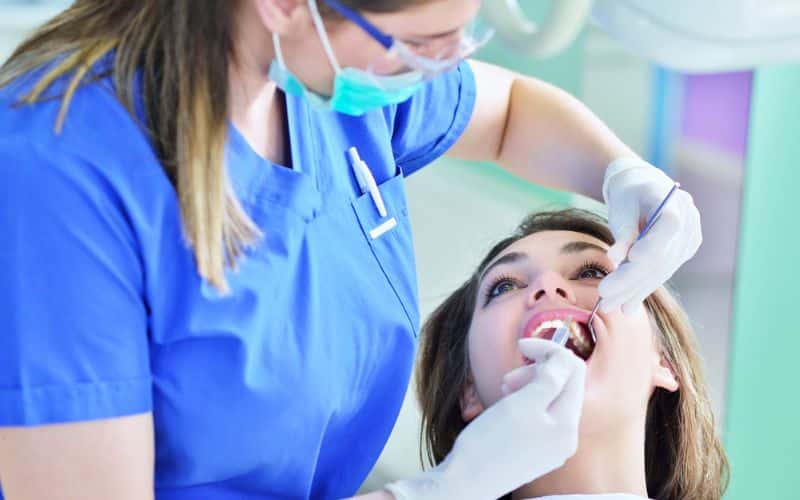 Examination by a Dental Hygienist or Dentist 
