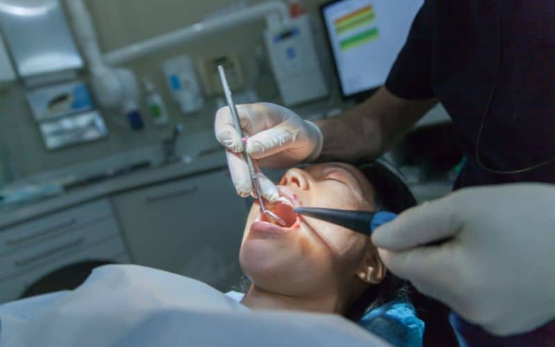 Surgical extraction of a wisdom tooth by a dentist
