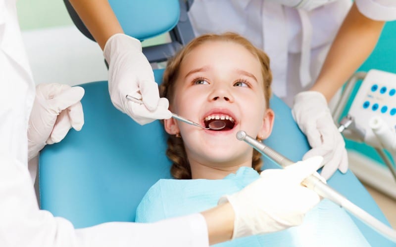 little girl visiting dentist