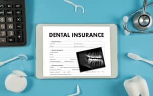 dental-insurance-toothache-doctor-patient work paper claim insurance saving